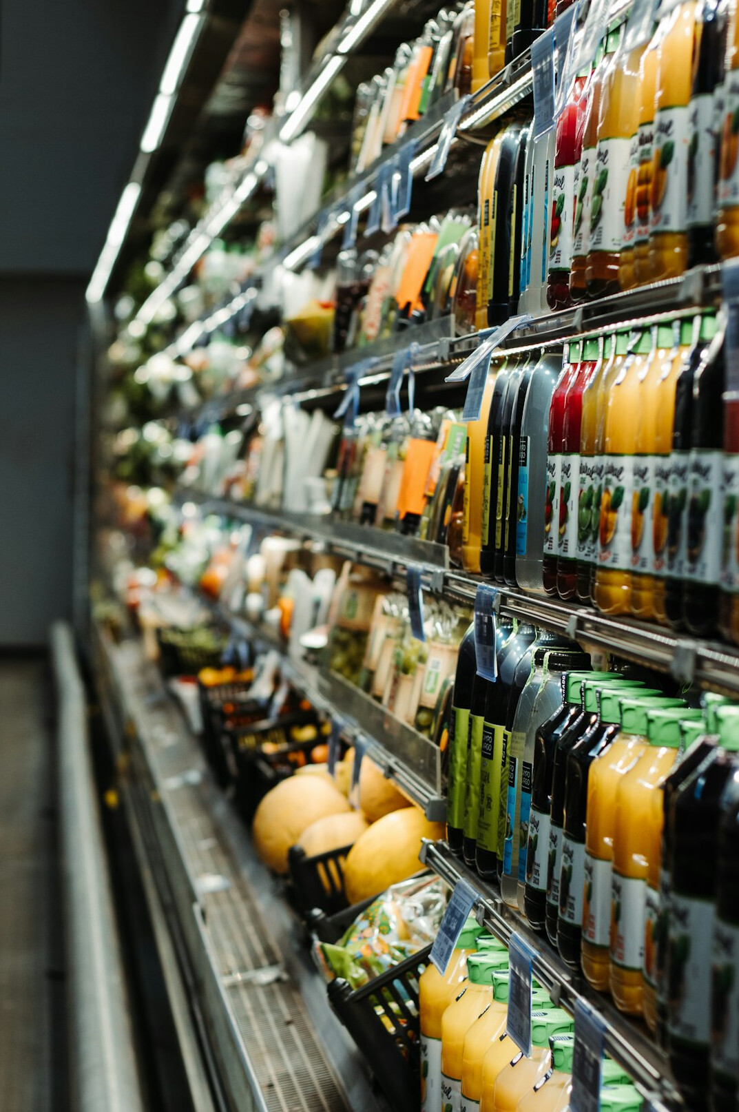empty supermarket aisle at night