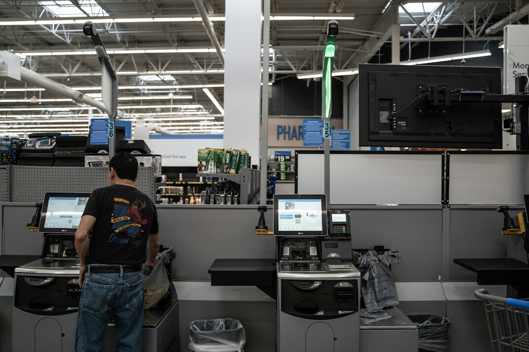 store security guard checking monitors