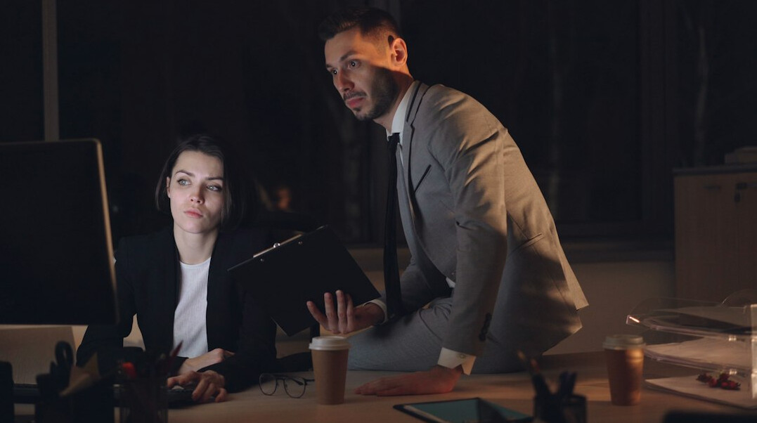 detective talking to staff